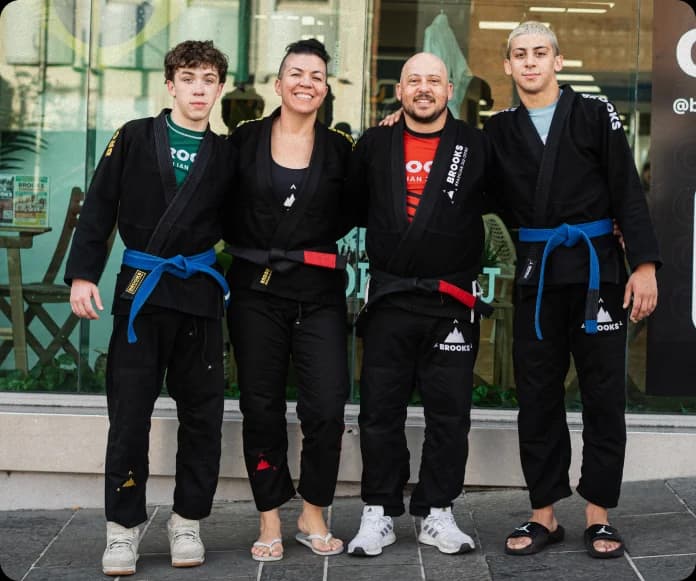 Brooks BJJ coaching team in traditional kimonos